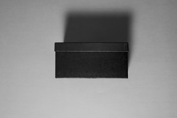 Black Shoe Box Mockup isolated on gray with clipping path.High resolution photo.