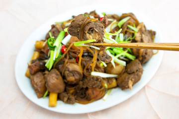 Korean chicken stew with soy sauce, glass noodle, rice cake and vegetables