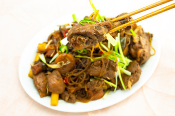 Korean chicken stew with soy sauce, glass noodle, rice cake and vegetables