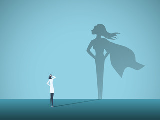 Female doctor looking at superhero shadow on the wall. Hospital staff, nurses heroes fight coronavirus pandemic. © jozefmicic