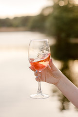 glass of wine on the sunset