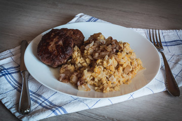 pea porridge with fried onions and homemade patties