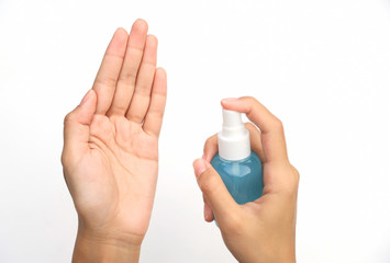 hand using alcohol spray for cleaning bacteria or virus 