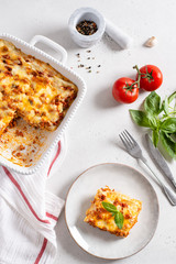Traditional italian lasagna with vegetables, minced meat, cheese bolognese and bechamel sauce. Top view, menu, recipe