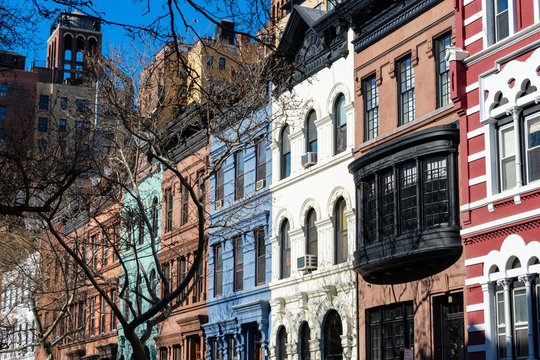 A Row of Old Colorful Brownstone Townhouses on the Upper West Side of New York City