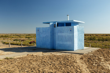 roadside toilet on the highway in the steppe of Kazakhstan.