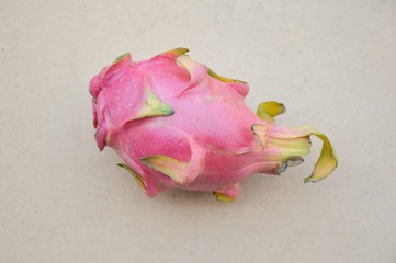 dragon fruit on wood plank