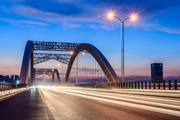 Modern bridge night, day and orange light blue. 