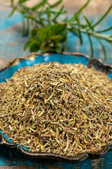 Bowl with dried French seasoning, herbs of Provence