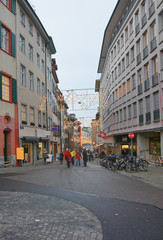Fototapeta na wymiar Street view with Christmas decoration in Old Town in Basel
