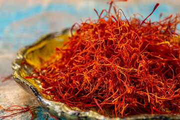 Naklejka premium Real red dried shaffron spice close up