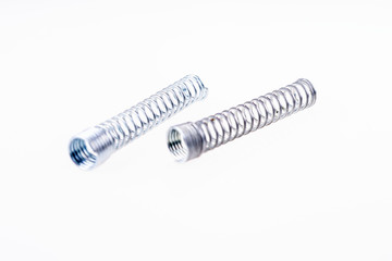 Two silver metal springs isolated on a white background
