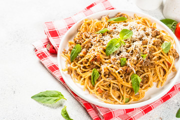 Pasta Bolognese in white plate.