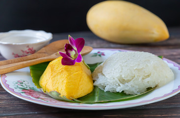  Mango Sticky Rice Thai snacks on a plate with banana leaves