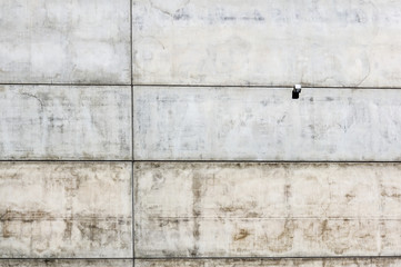 modern industrial concrete wall with a spotlight for led lighting .