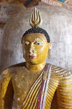 The Buddha statue in Cave Temple. Dambulla, Sri Lanka. It is the largest and best preserved cave temple complex.