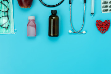 Table top view aerial image of accessories healthcare & medical background concept.Essential...