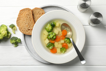 Soup on wooden background, top view. Healthy food