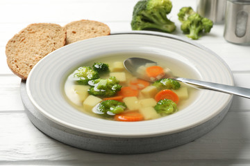 Soup on wooden background, close up. Healthy food