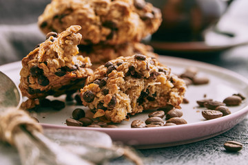 Peace of homemade oatmeal cookies with chocolate. Close up
