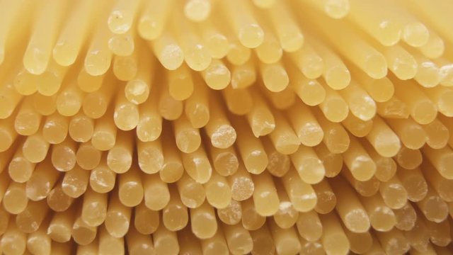 Uncooked pasta spaghetti macro shot