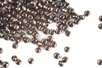 close up multi colored beads heap isolated on white