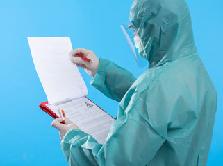 Doctor holding test tube with Positive Coronavirus or Covid-19 test blood sample - Concept of...