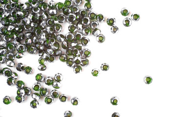 close up multi colored beads heap isolated on white