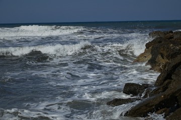 waves crashing on rocks