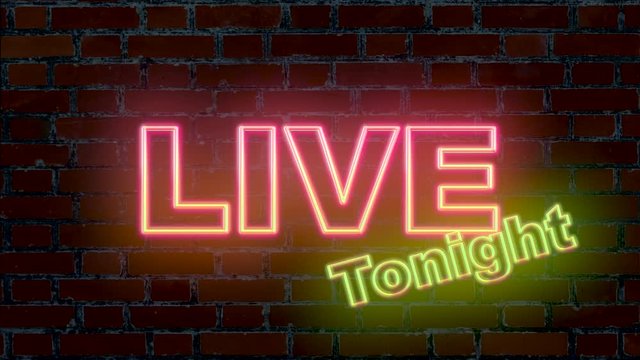 Illuminated text Live tonight in pink and yellow color with red brick wall in background,tv show