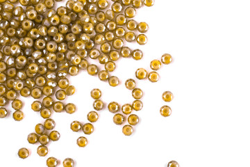 close up multi colored beads heap isolated on white