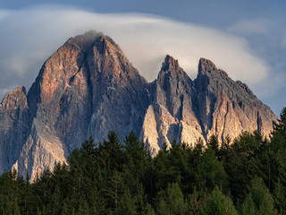 Clouds over mountains at sunset