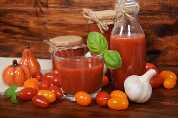 fresh tomato juice with basil in a glass