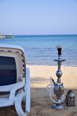 sunny day on the beach with Shisha / argila / smoking in Egypt north coast / dahab / hurgada / sharm el sheikh / taba / alexandria  - best place for vacation  holiday relaxation beach sand inspiration