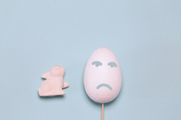 Creative easter composition with decorative white egg and bunny