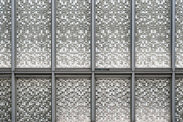 Facade Silver Glass Panels with Metallic Gradient.