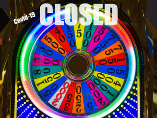 Conceptual image about casino closed stop sign indicating warning of Coronavirus