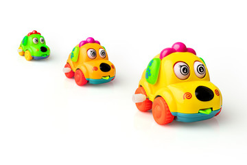 Yellow Toys car wind up.Toys for children 6+ months, On white background	
