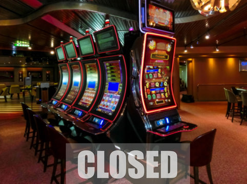 Conceptual image about casino closed stop sign indicating warning of Coronavirus