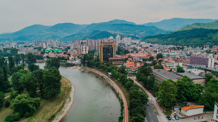 city photographed from air by drone. Old balkan buildings and communism type of architecture. Zenica - Bosnia and Herzegovina