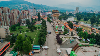 Aerial view of downtown Zenica at sunset, Bosnia. City photographed by drone, traffic and objects , landscape