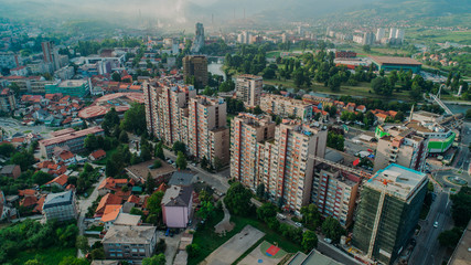 Aerial view of downtown Zenica at sunset, Bosnia. City photographed by drone, traffic and objects , landscape