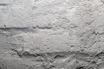 Obraz na płótnie Canvas Whitewashed old grungy brick wall in the basement. close