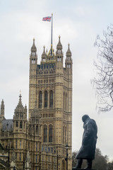 LONDON, ENGLAND - 2016 JANUARY 25. Big Ben and Sir Winston Churchill at Westminster in London.