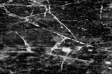 Ice cover of a reservoir with various cracks