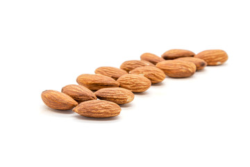 Almond nuts isolated with white background.