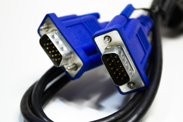 DVI and D-SUB cable for LCD and CRT monitors isolated on white background. Electronic black wire with blue connector.