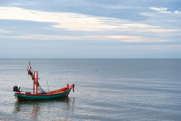 Fototapeta premium Fishing boat anchored on the seashore