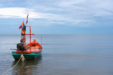 Fishing boat anchored on the seashore