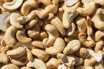nuts in warm toning, background texture and place for advertising
